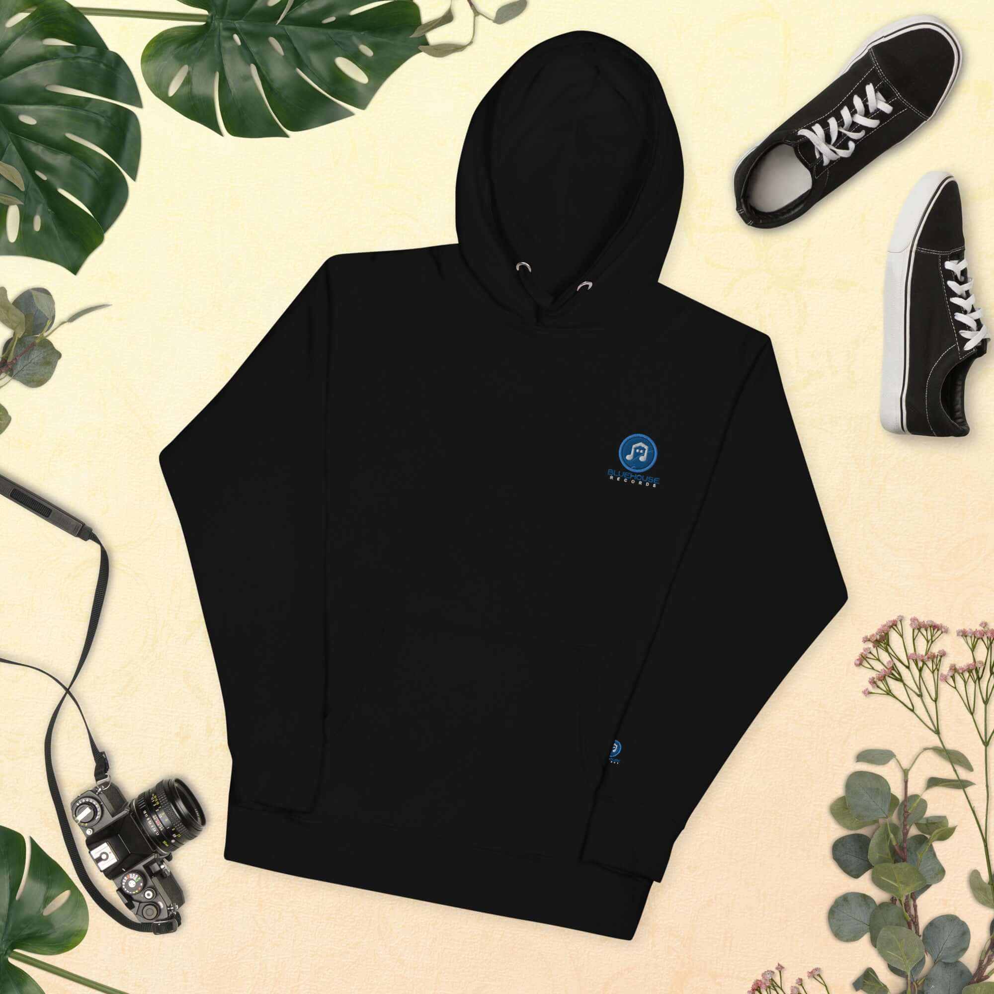 Unisex hoodie with soft fabric, front pouch pocket, and warm hood, made from cotton blend for cozy streetwear style